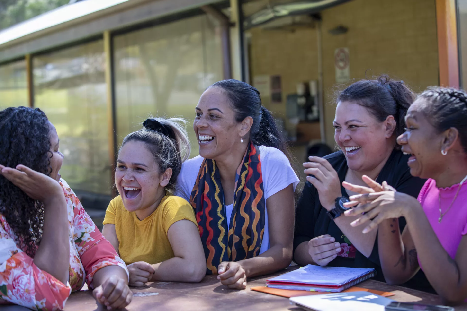 young-aboriginal-woman-laughing-together-inclusee