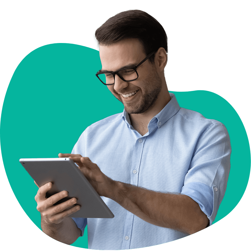 Online volunteer man happily navigating a tablet.
