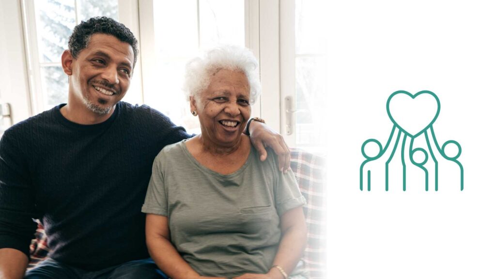 Older Australian woman being supported by son.